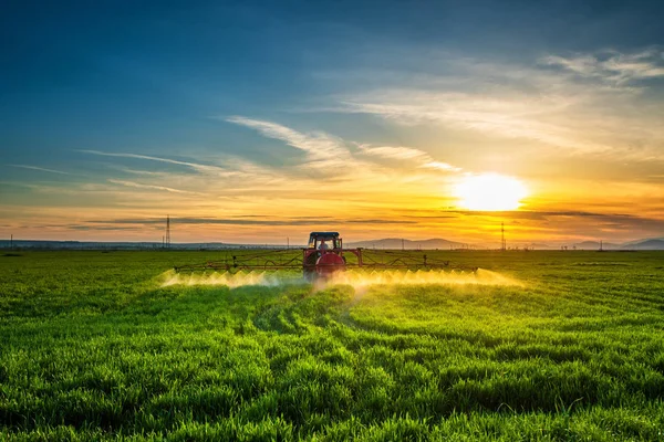 depositphotos_191875876-stock-photo-farming-tractor-plowing-and_p28459